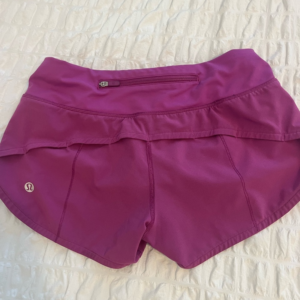 Vivid plum size 0 low rise speed ups